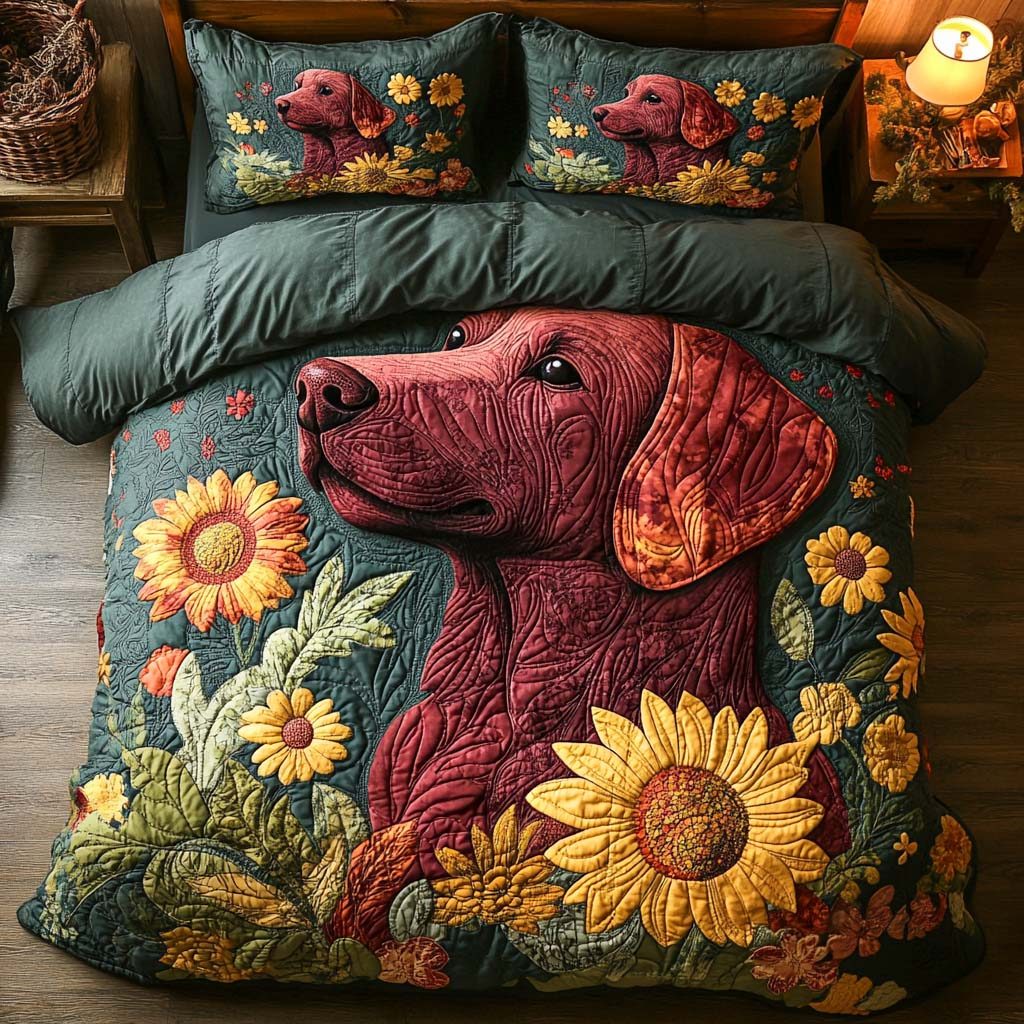 Crimson Bloom quilted 3-piece bedding set on a made bed with two matching pillow shams