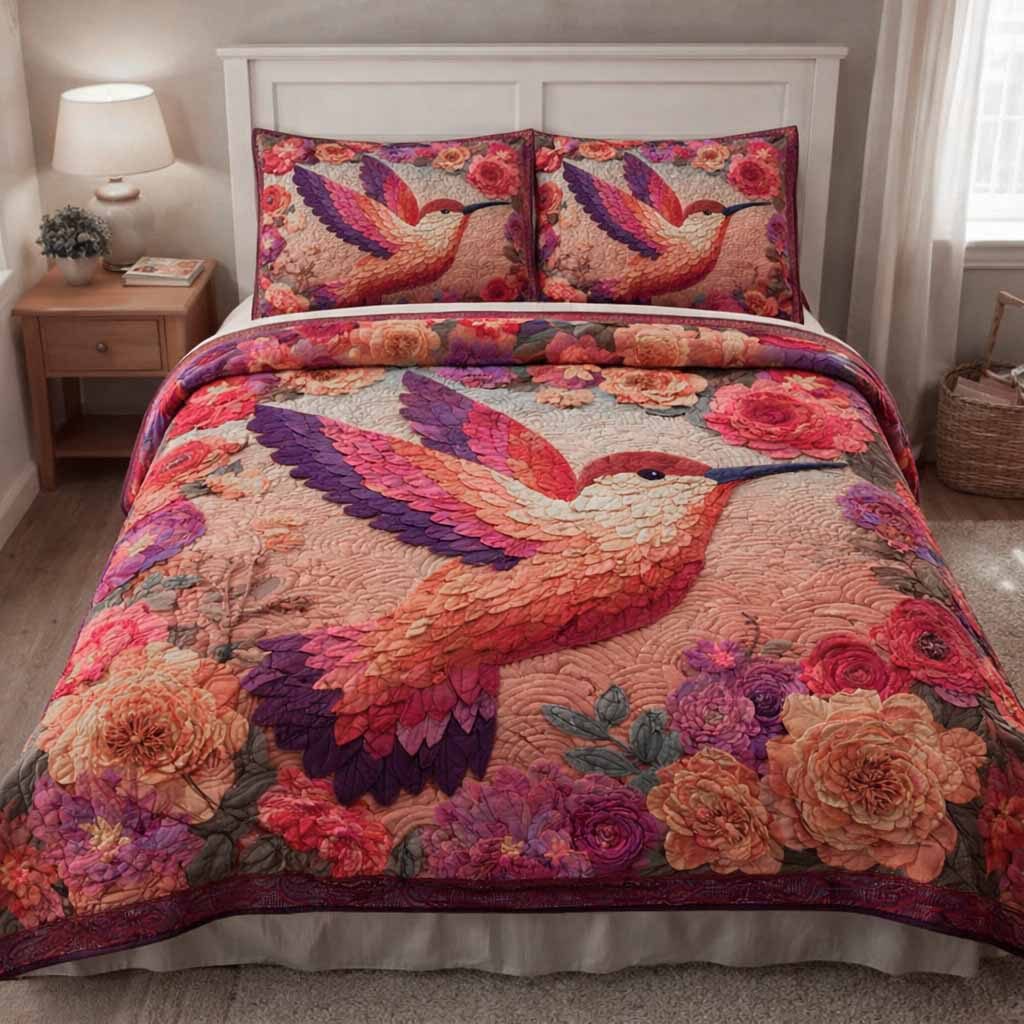 Crimson Flight quilted 3-piece bedding set on a made bed with two matching pillow shams