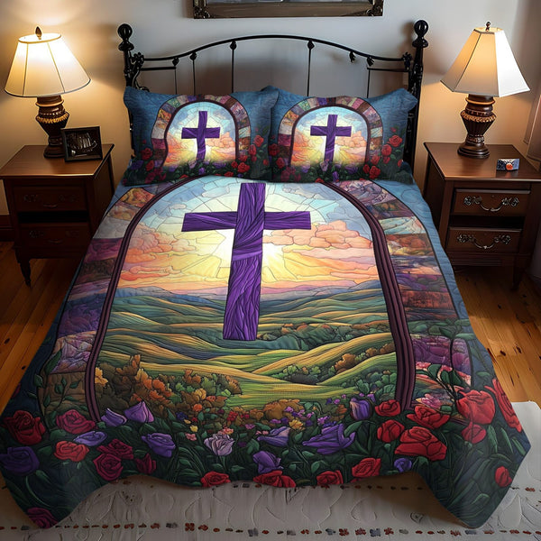 Cross of Comfort quilted 3-piece bedding set on a made bed in a softly lit bedroom