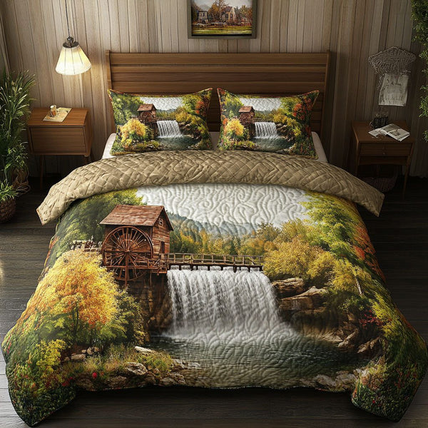 Crystal Falls quilted 3-piece bedding set on a made bed with two matching pillow shams