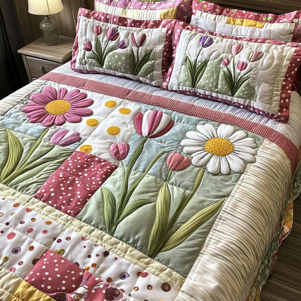 Dainty Dreams quilted 3-piece bedding set on a made bed with two matching pillow shams
