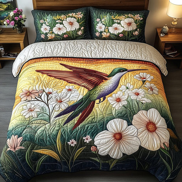 Daisy Breeze quilted 3-piece bedding set on a made bed with two matching pillow shams