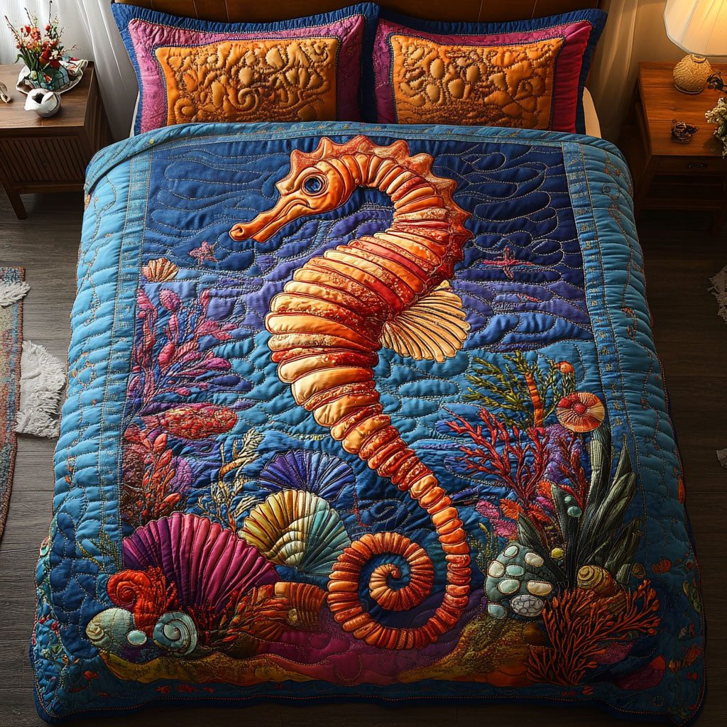 Deep Blue Comfort quilted 3-piece bedding set on a made bed with two matching pillow shams