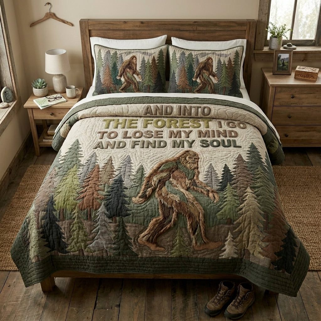Deep Sasquatch quilted 3-piece bedding set on a made bed with two matching pillow shams