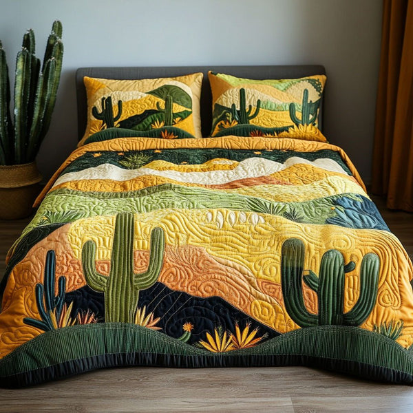 Desert Bloomscape quilted 3-piece bedding set on a made bed with two matching pillow shams