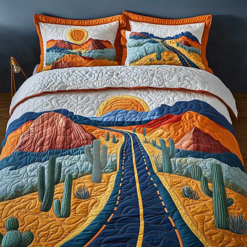 Desert Highway quilted 3-piece bedding set on a made bed with two matching pillow shams