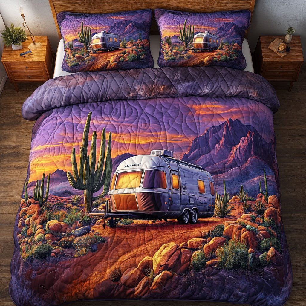 Desert Road quilted 3-piece bedding set on a made bed with two matching pillow shams