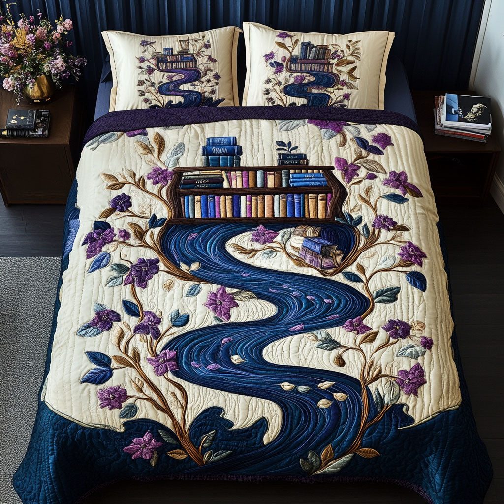 Dewy Pages quilted 3-piece bedding set on a made bed with two matching pillow shams