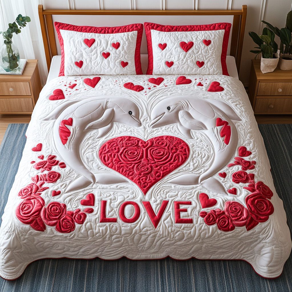Dolphin Serenade quilted 3-piece bedding set on a made bed in a light coastal bedroom