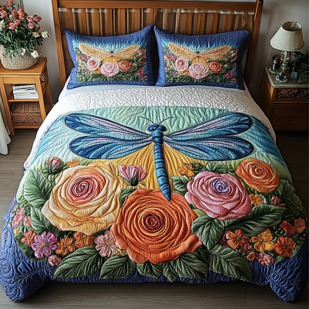 Dragonfly Dreams quilted 3-piece bedding set on a made bed with two matching pillow shams