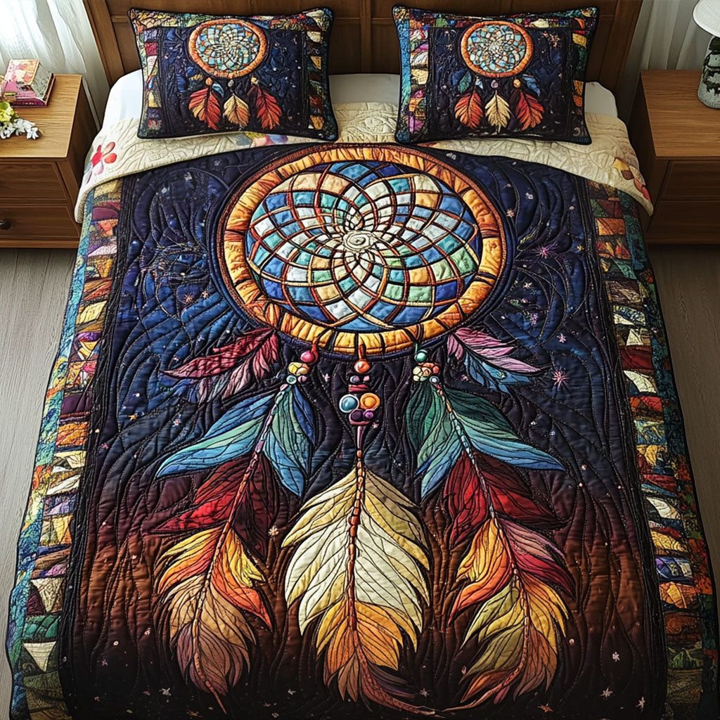 Dream Haven quilted 3-piece bedding set on a made bed with two matching pillow shams