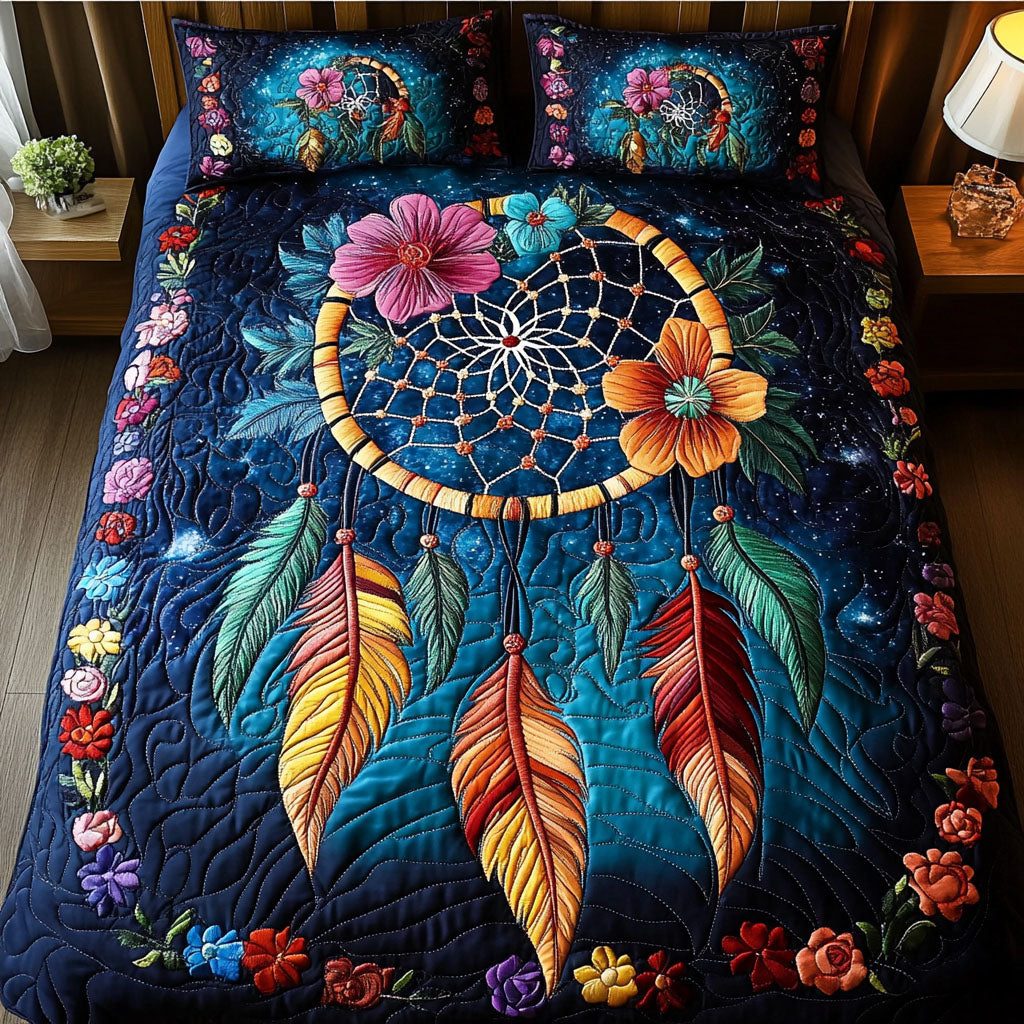 Dream Weaver quilted 3-piece bedding set on a made bed with two matching pillow shams