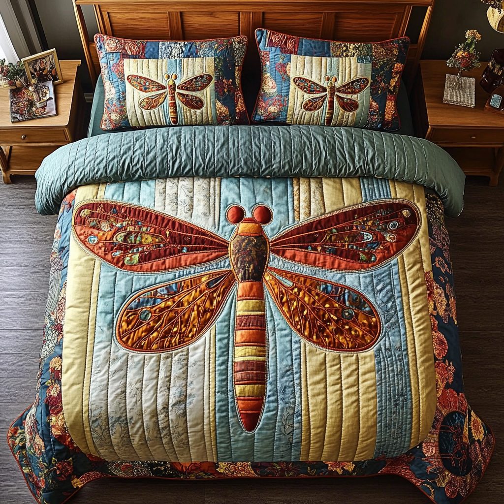 Dream Wings quilted 3-piece bedding set on a made bed with two matching pillow shams