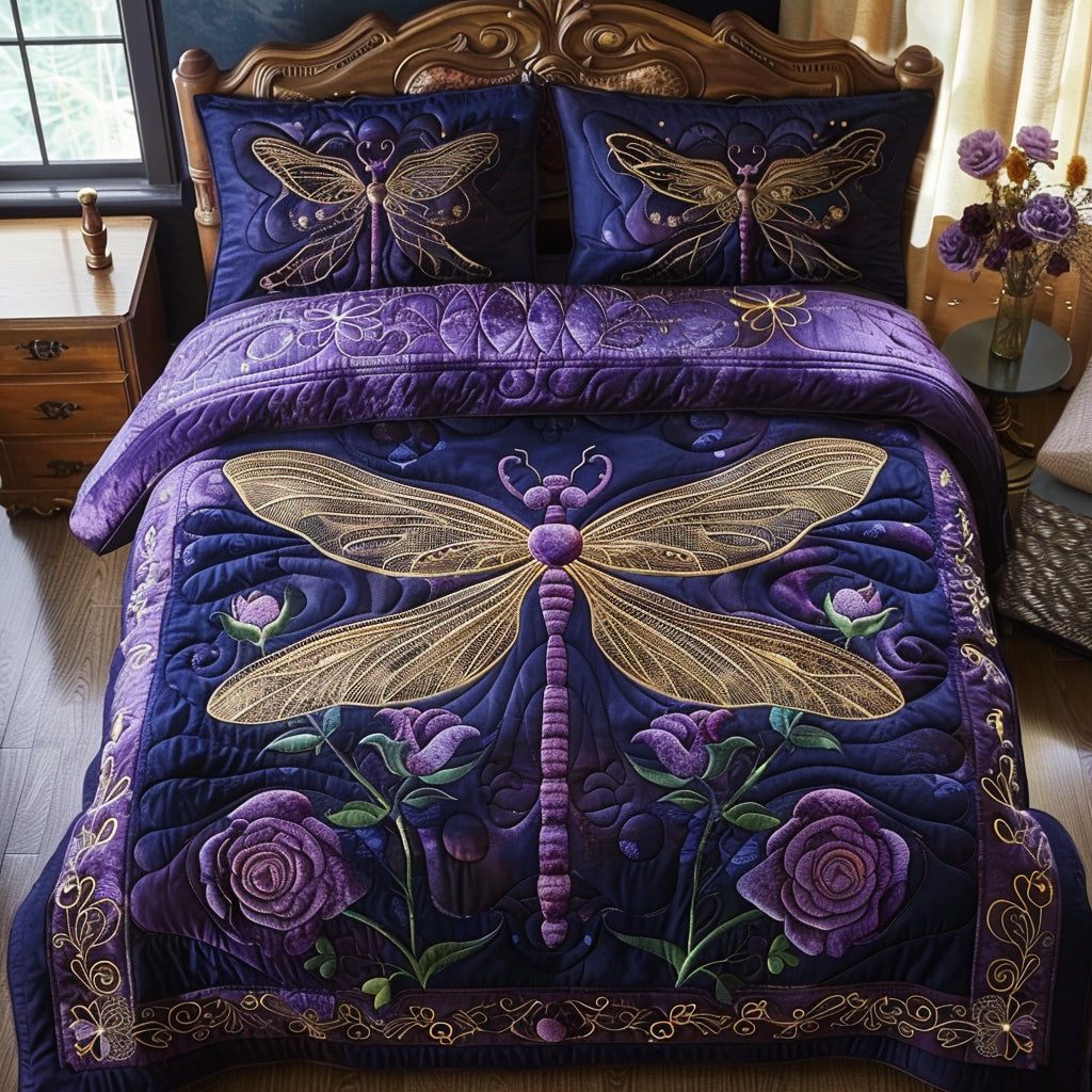 Dreamy Dragonfly quilted 3-piece bedding set on a made bed with two matching pillow shams