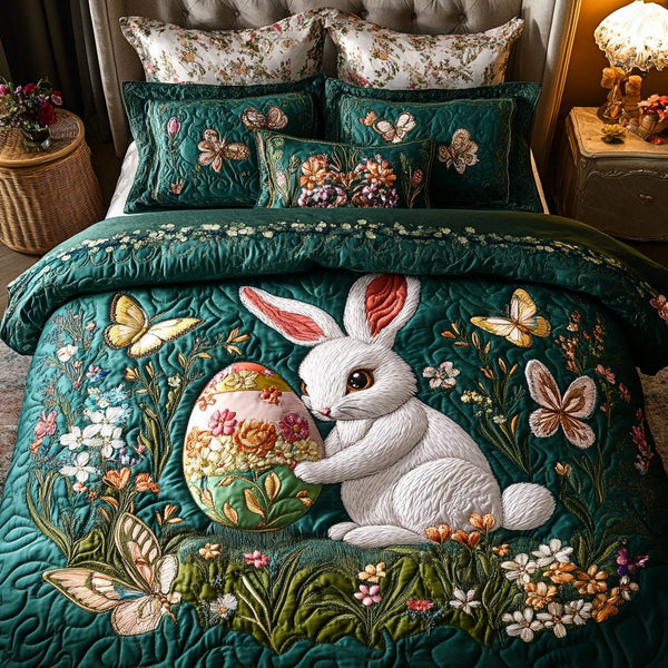 Easter Meadow quilted 3-piece bedding set on a made bed with two matching pillow shams