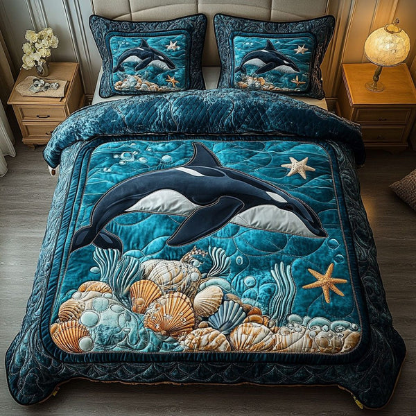 Echo of Oceans quilted 3-piece bedding set on a made bed in a light coastal bedroom