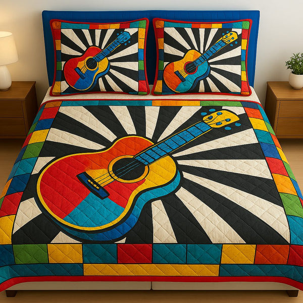 Electric Beat quilted 3-piece bedding set on a made bed with two matching pillow shams