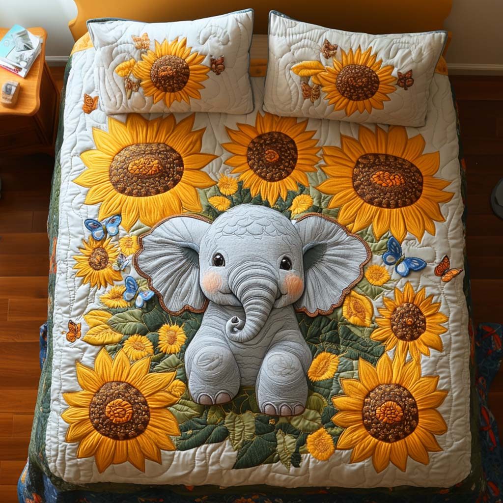 Elephant Harmony quilted 3-piece bedding set on a made bed with two matching pillow shams