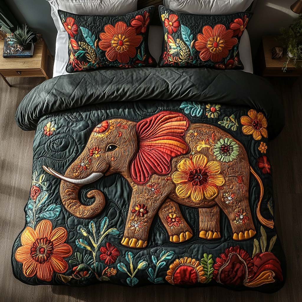 Elephant Meadow Bliss quilted 3-piece bedding set on a made bed with two matching pillow shams