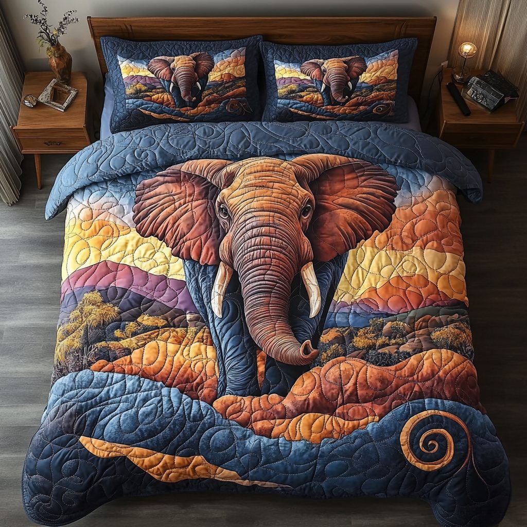Elephant Reverie quilted 3-piece bedding set on a made bed with two matching pillow shams