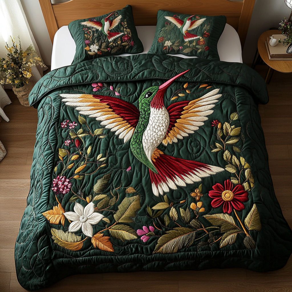 Emerald Elegance quilted 3-piece bedding set on a made bed with two matching pillow shams