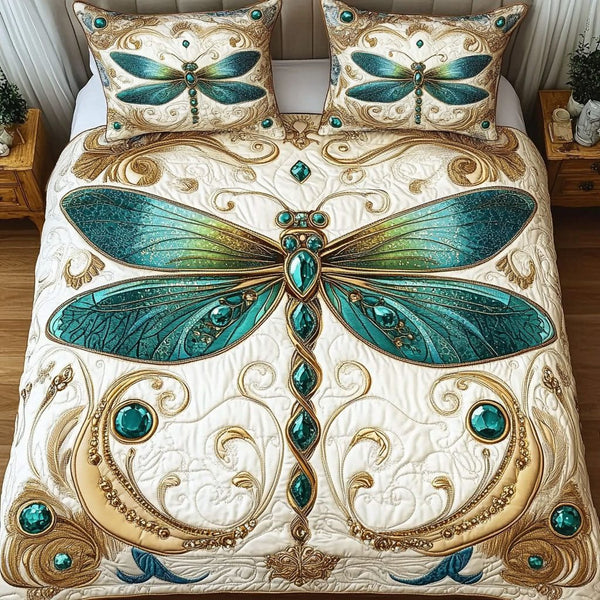 Emerald Glow quilted 3-piece bedding set on a made bed with two matching pillow shams