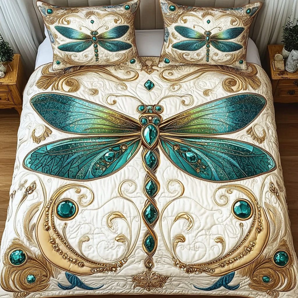 Emerald Glow quilted 3-piece bedding set on a made bed with two matching pillow shams