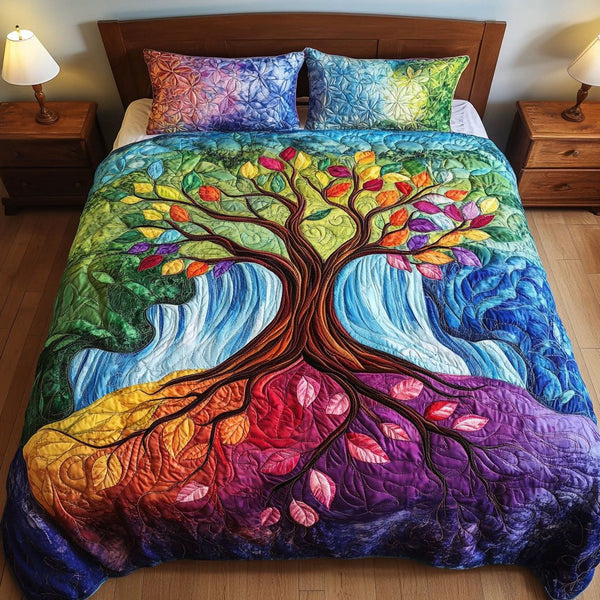Enchanted Forest Cascade quilted 3-piece bedding set on a made bed with two matching pillow shams