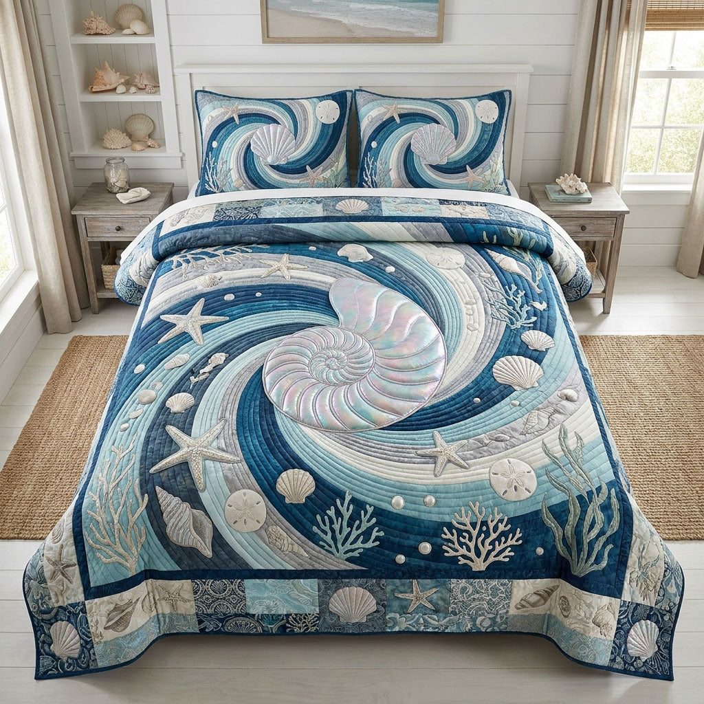 Endless Blue quilted 3-piece bedding set on a made bed with two matching pillow shams