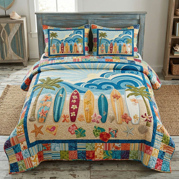 Endless Summer Surf quilted 3-piece bedding set on a made bed in a light coastal bedroom