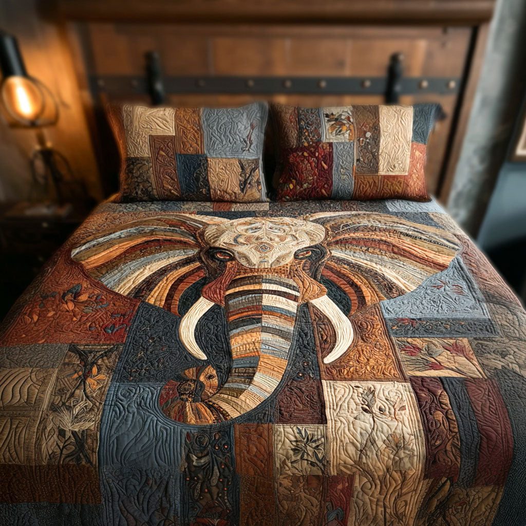 Enlightened Tusks quilted 3-piece bedding set on a made bed with two matching pillow shams