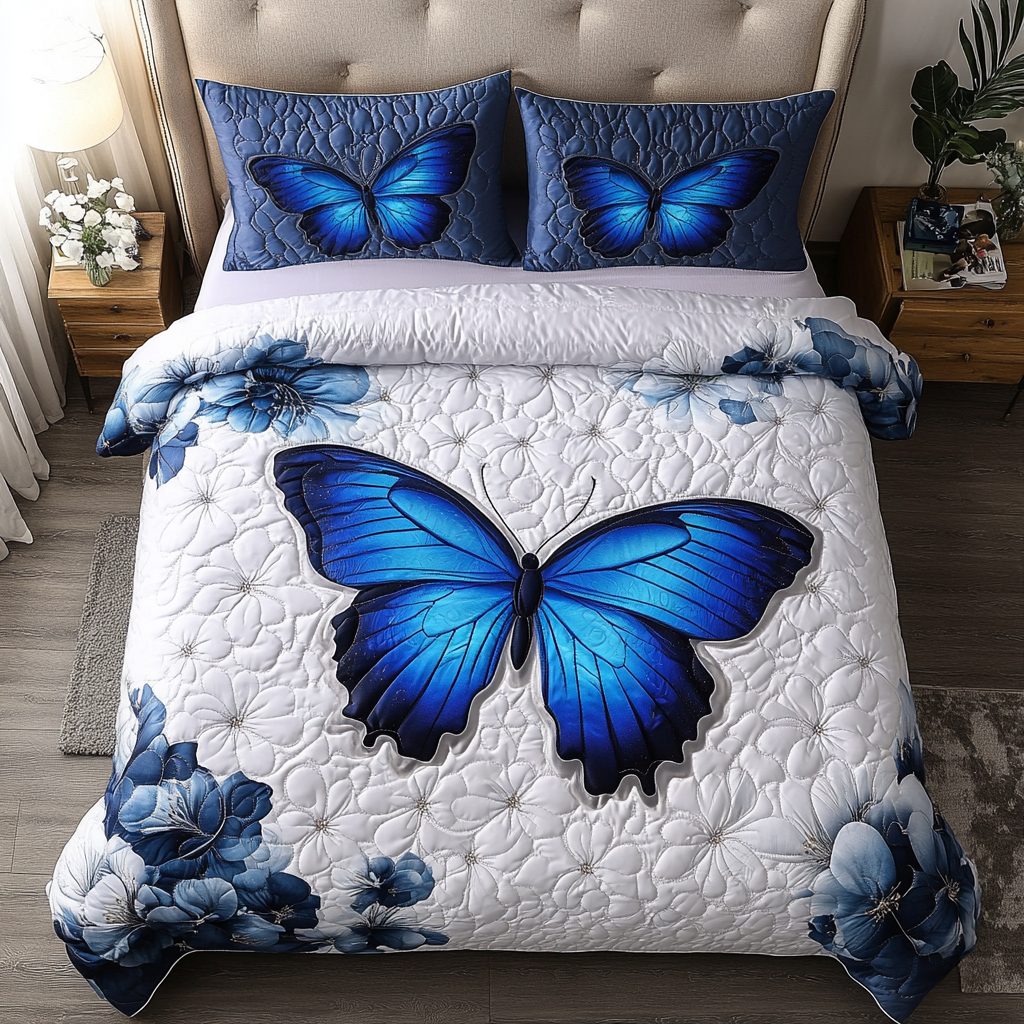 Eternal Butterfly quilted 3-piece bedding set on a made bed with two matching pillow shams
