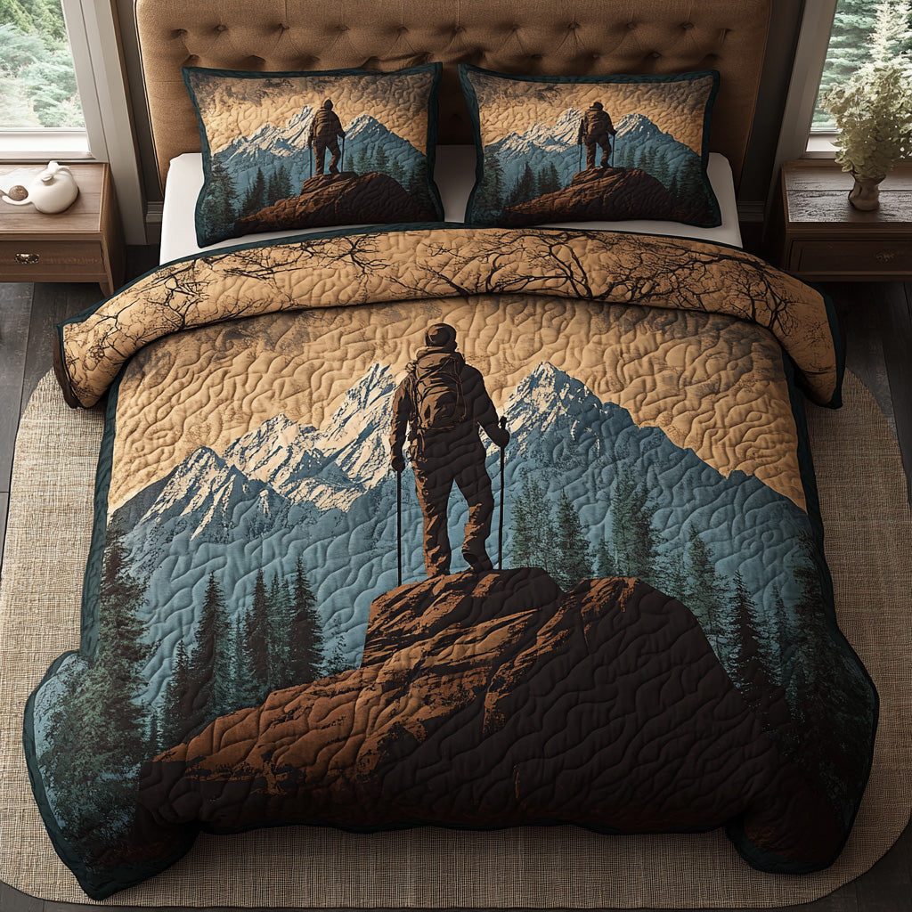Evergreen Escape quilted 3-piece bedding set on a made bed with two matching pillow shams
