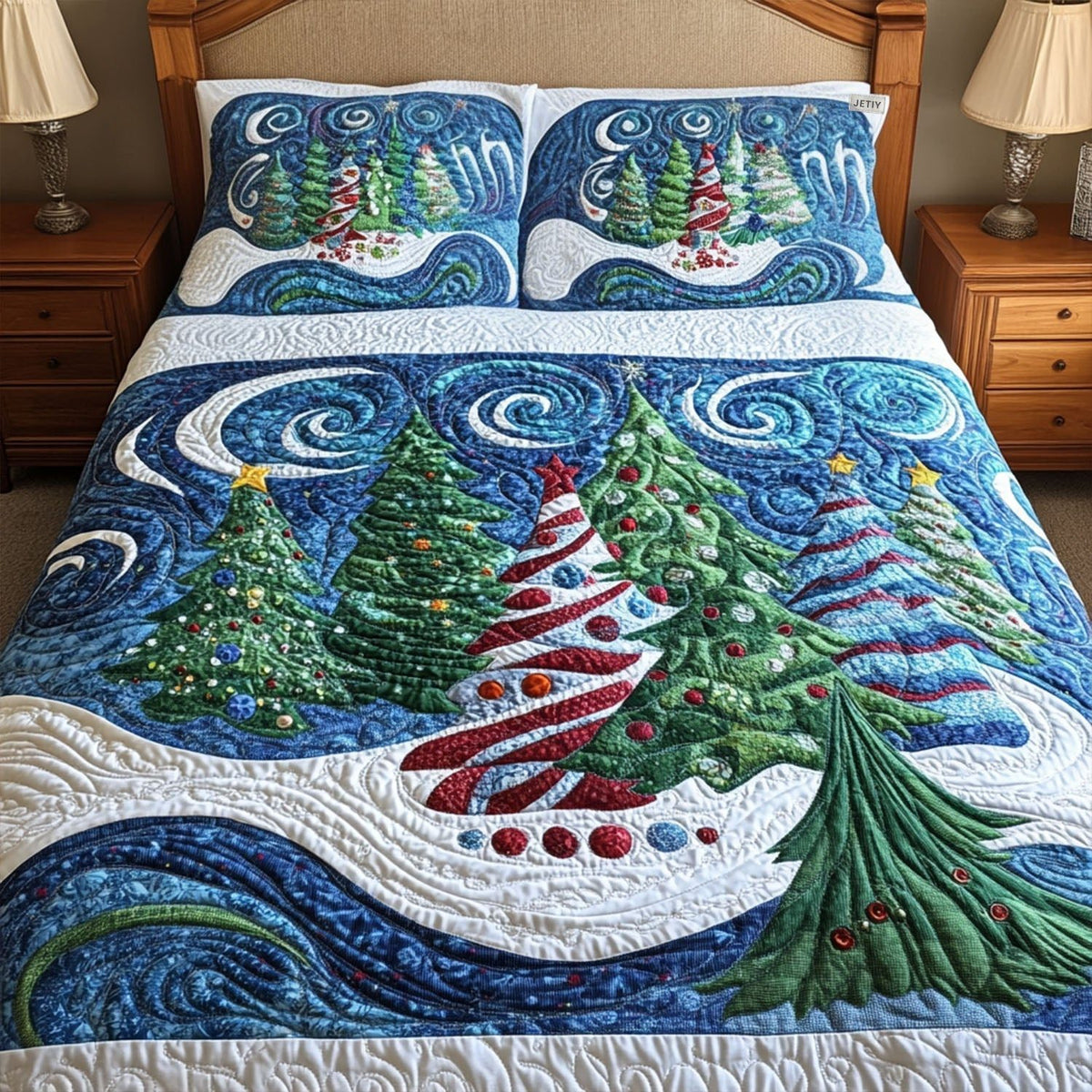 Evergreen Magic quilted 3-piece bedding set on a made bed with two matching pillow shams