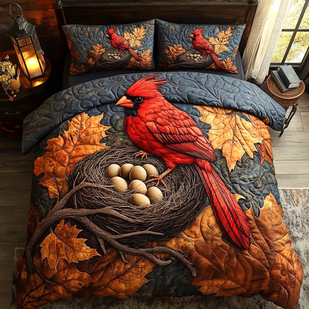 Fall Cardinal quilted 3-piece bedding set on a made bed with two matching pillow shams