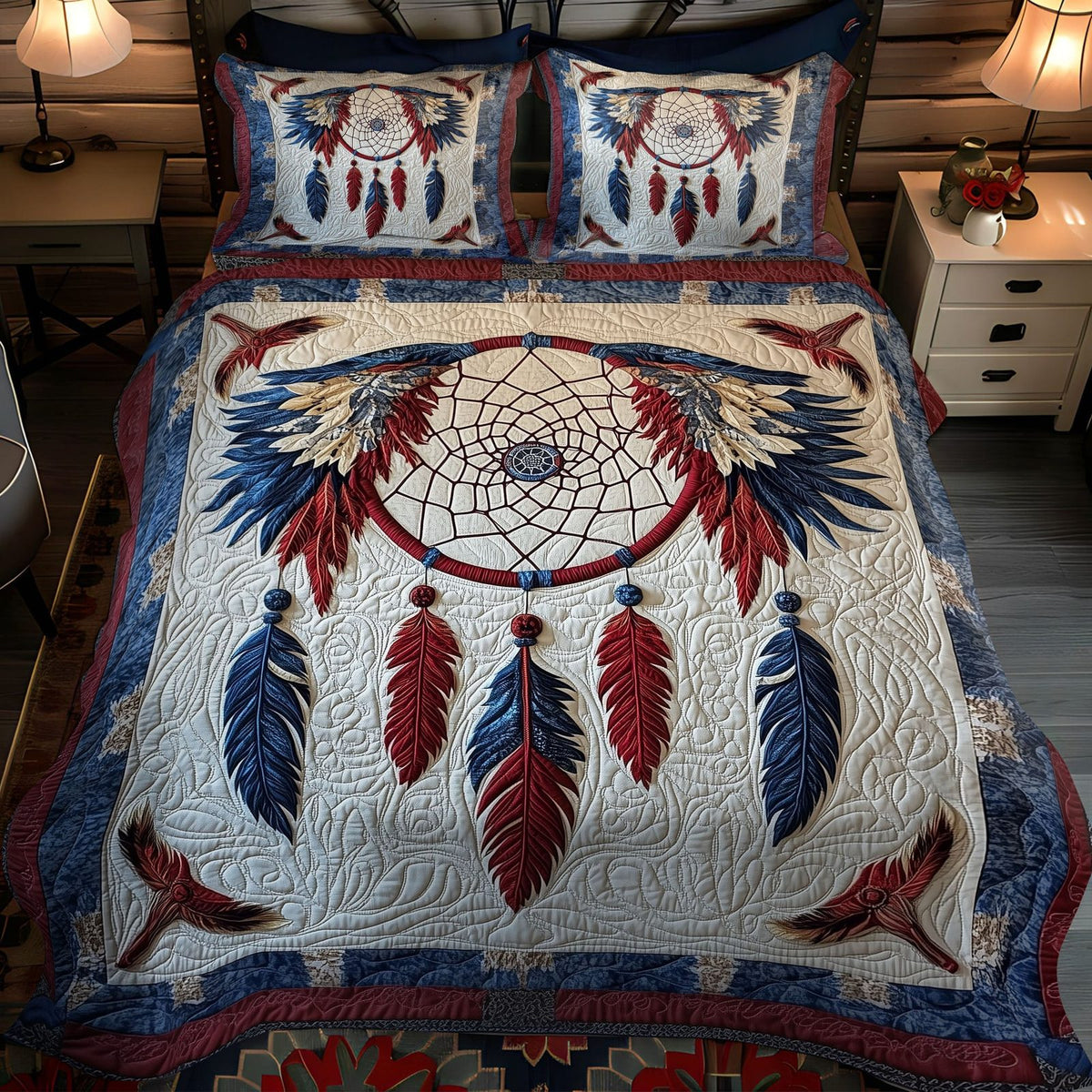Feather Dance quilted 3-piece bedding set on a made bed with two matching pillow shams
