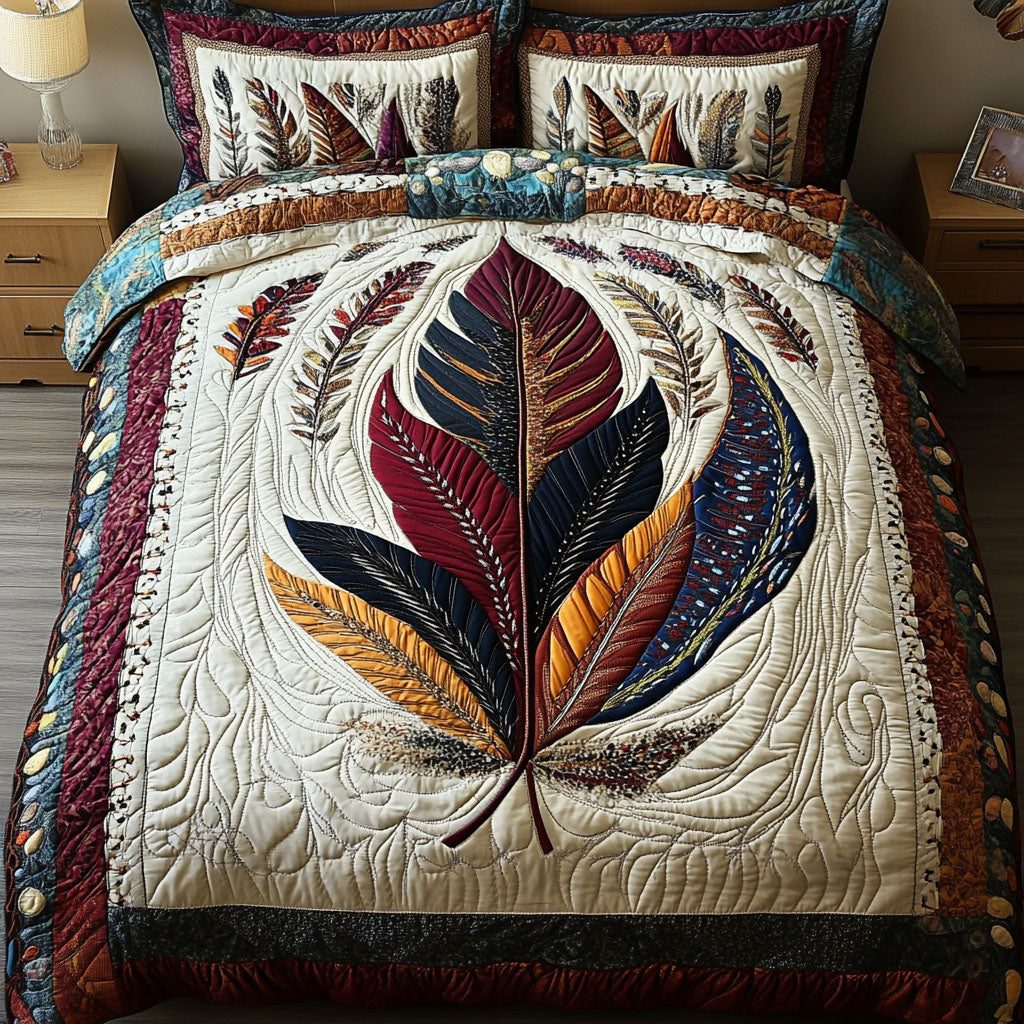 Feathered Peace quilted 3-piece bedding set on a made bed with two matching pillow shams