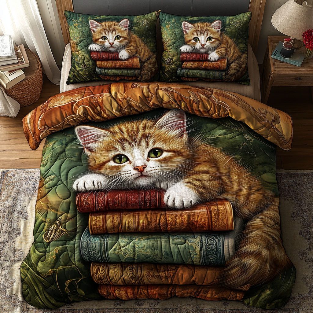 Feline Library quilted 3-piece bedding set on a made bed with two matching pillow shams