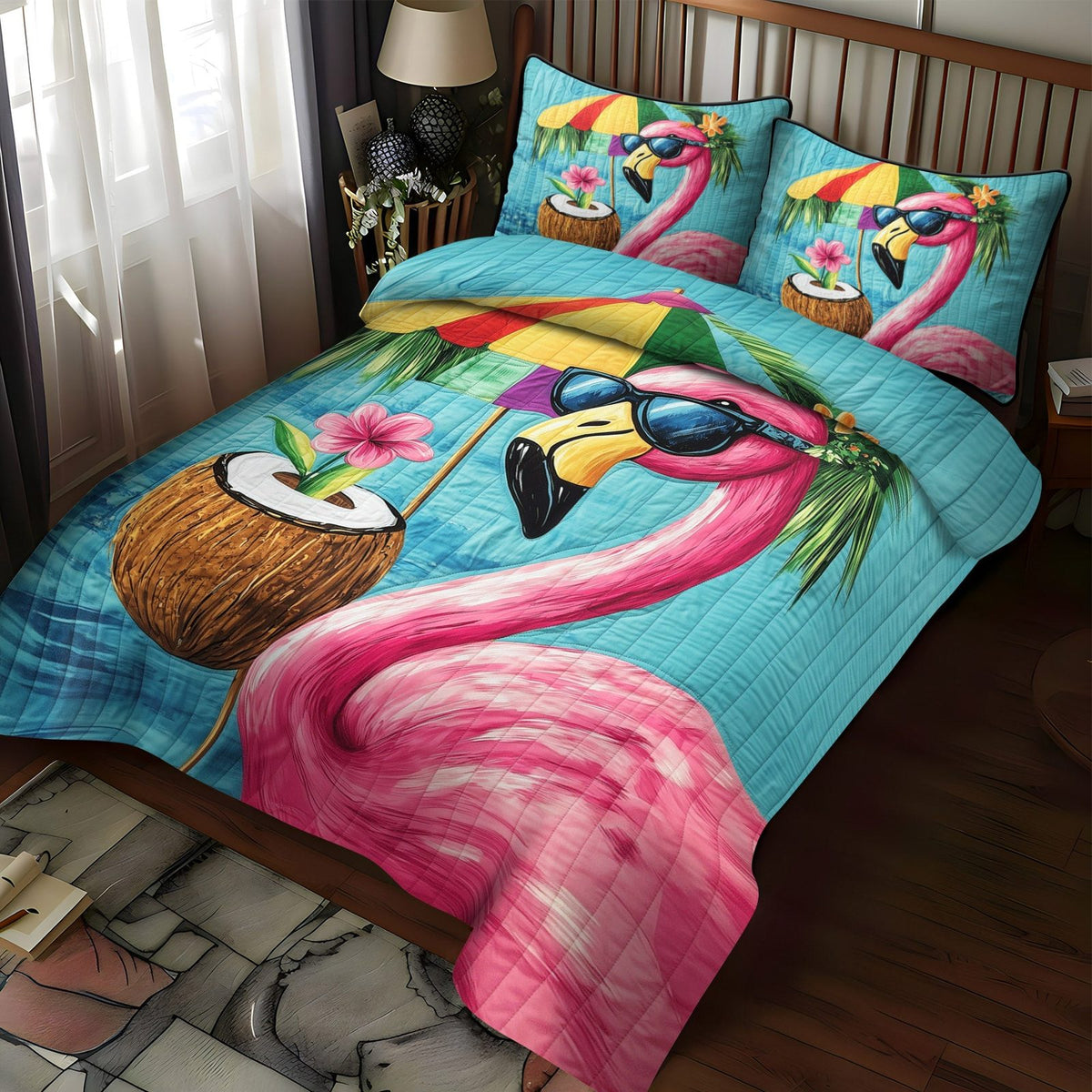 Flamingo Bliss quilted 3-piece bedding set on a made bed with two matching pillow shams