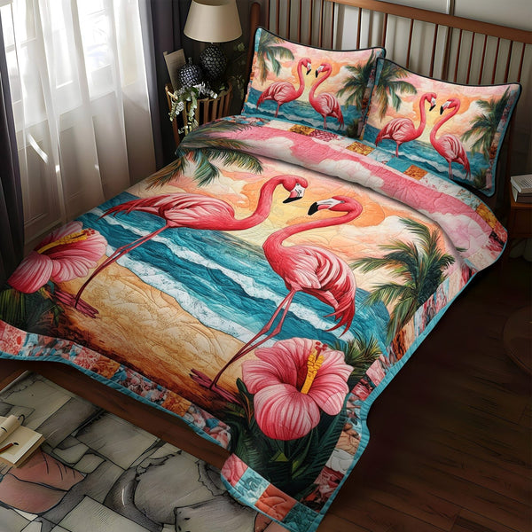 Flamingo Oasis quilted 3-piece bedding set on a made bed with two matching pillow shams