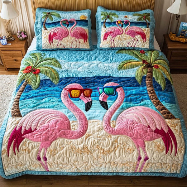 Flamingo Romance quilted 3-piece bedding set on a made bed with two matching pillow shams