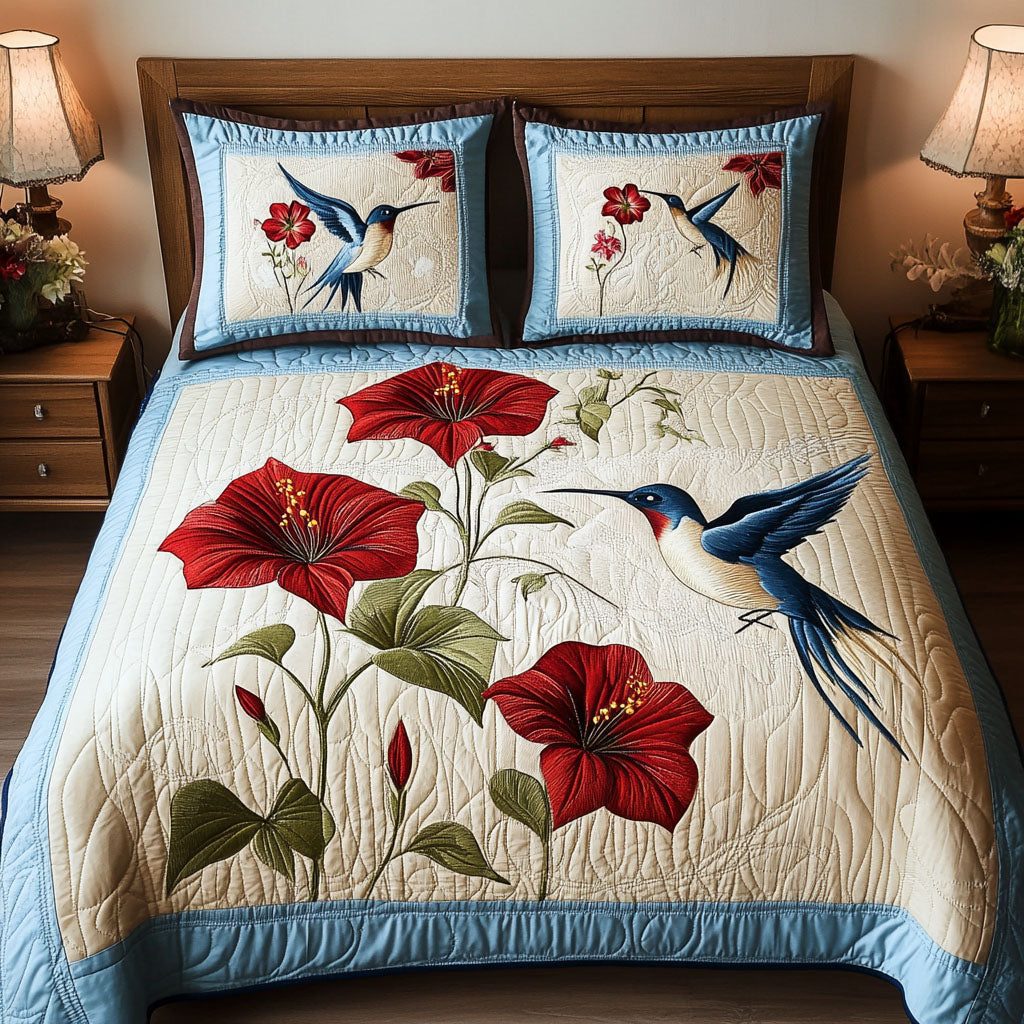 Flight Mirage quilted 3-piece bedding set on a made bed with two matching pillow shams