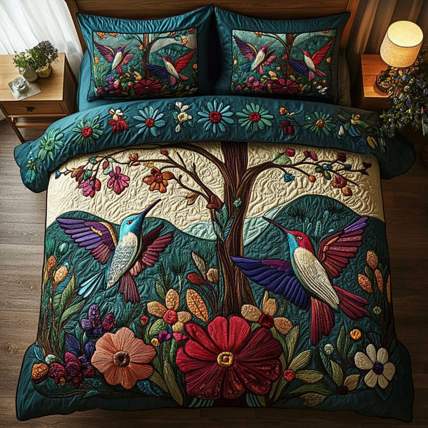 Flight of Colors quilted 3-piece bedding set on a made bed with two matching pillow shams
