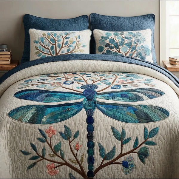 Floating Dragonfly quilted 3-piece bedding set on a made bed with two matching pillow shams
