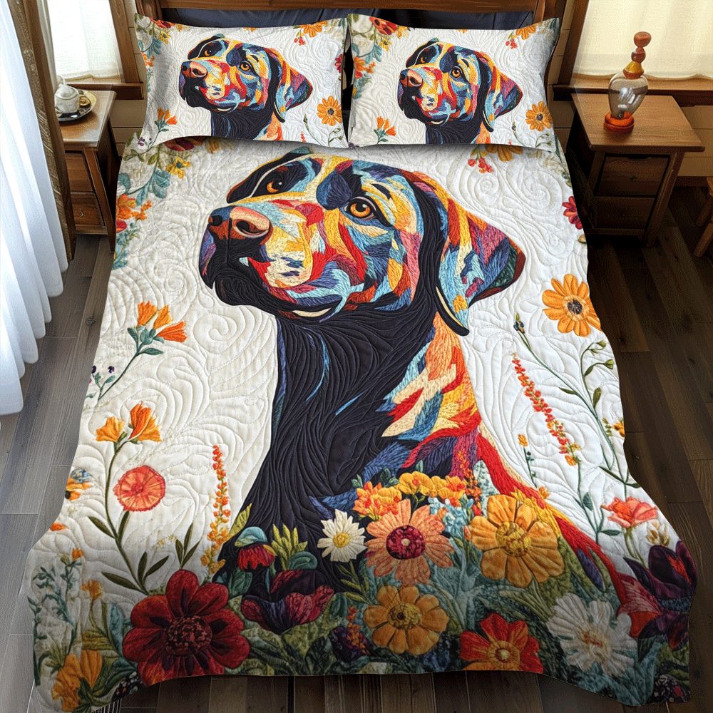 Floral Adorable Labrador quilted 3-piece bedding set on a made bed with two matching pillow shams