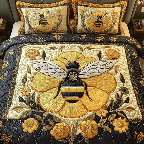Floral Bee quilted 3-piece bedding set on a made bed with two matching pillow shams
