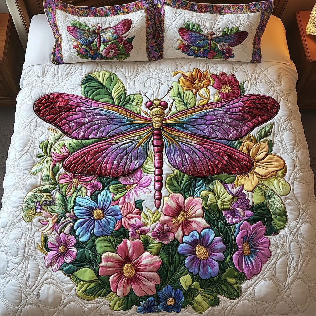 Floral Dragonfly quilted 3-piece bedding set on a made bed with two matching pillow shams