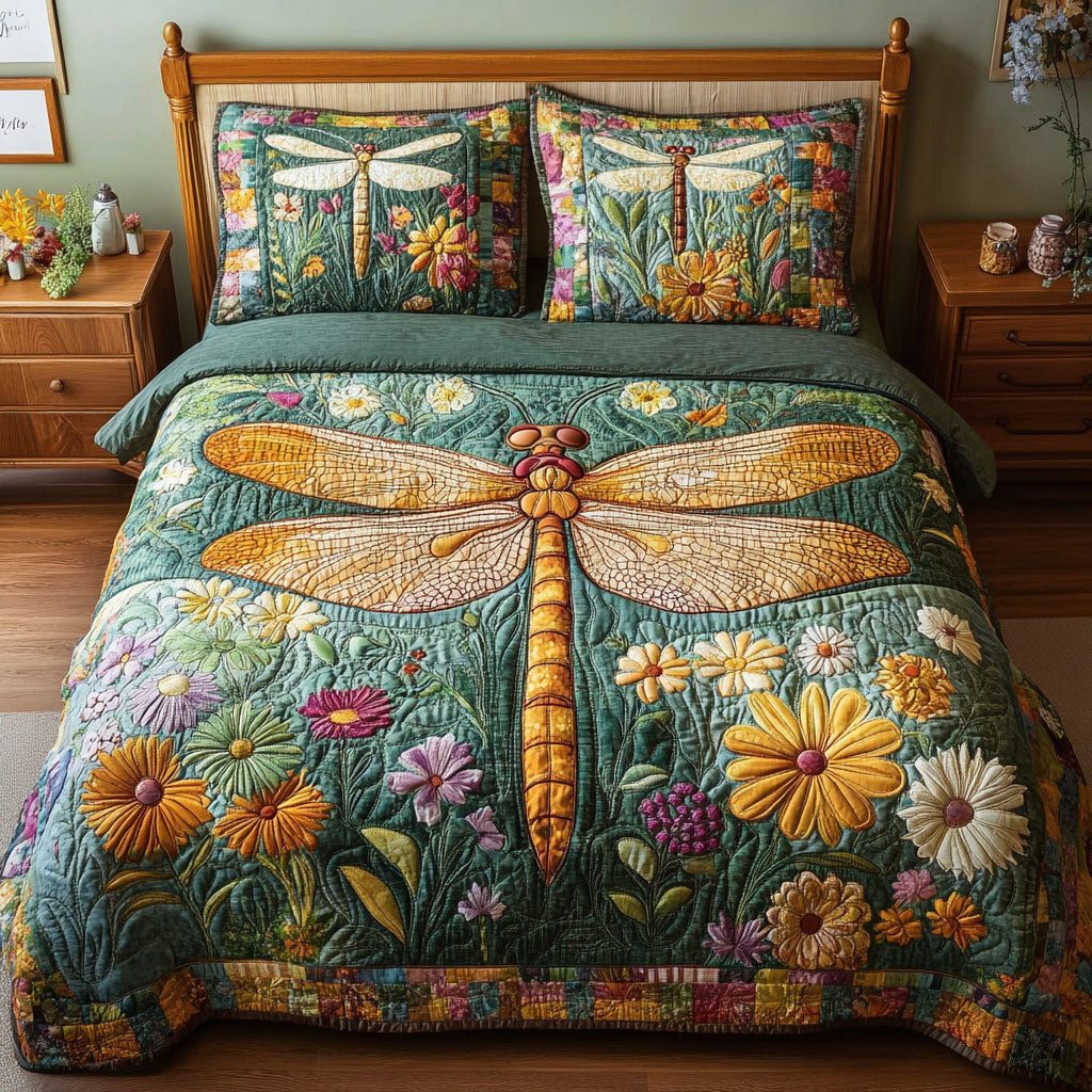 Floral Dragonfly quilted 3-piece bedding set on a made bed with two matching pillow shams