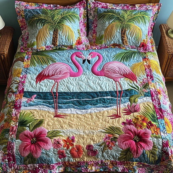 Floral Flamingo quilted 3-piece bedding set on a made bed with two matching pillow shams
