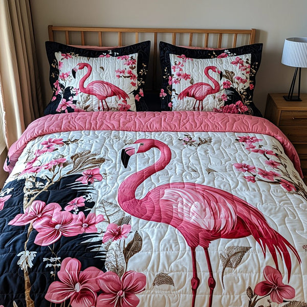 Floral Flamingo quilted 3-piece bedding set on a made bed with two matching pillow shams